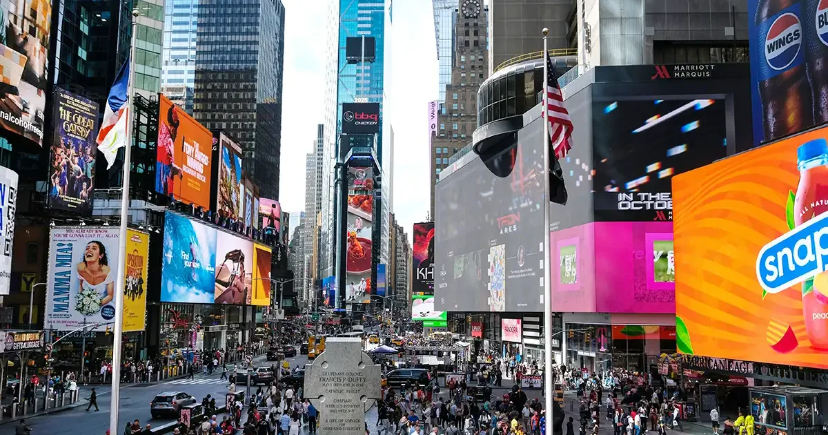 crowds in Times Square and billboards